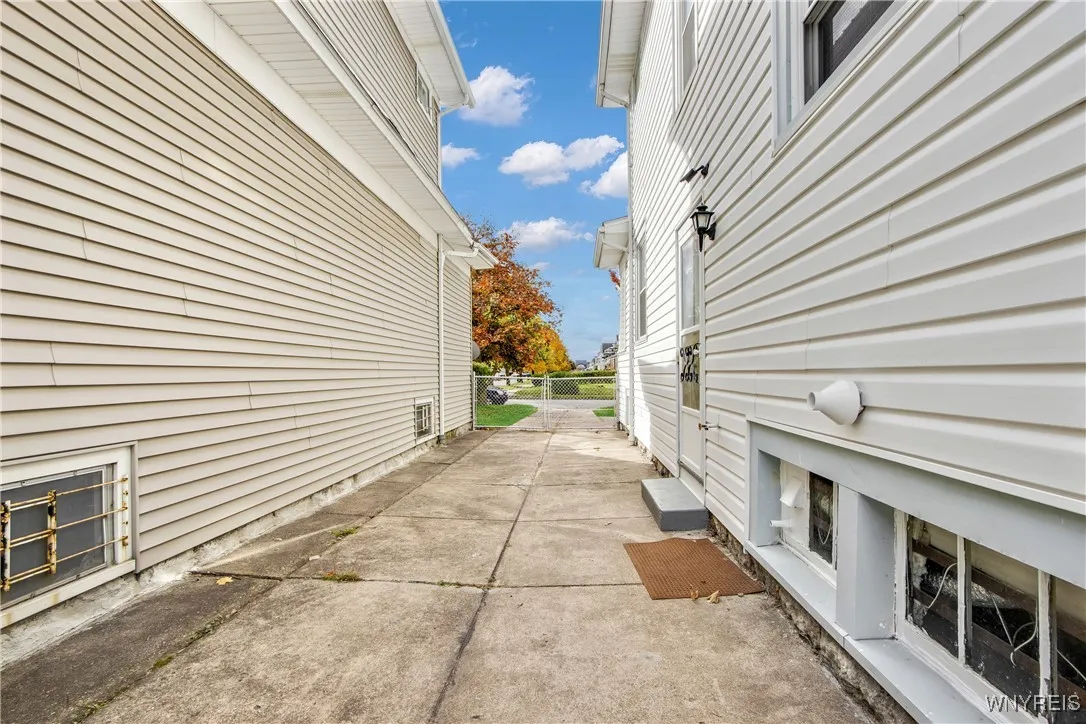 view from yard to street...side door entrance