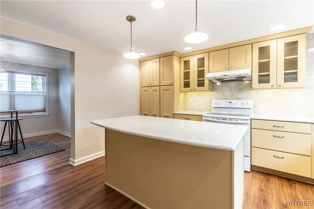 Have a seat at the breakfast bar or in the dinning/eating area!