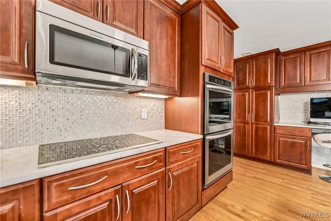 Built in double oven and glass top range.