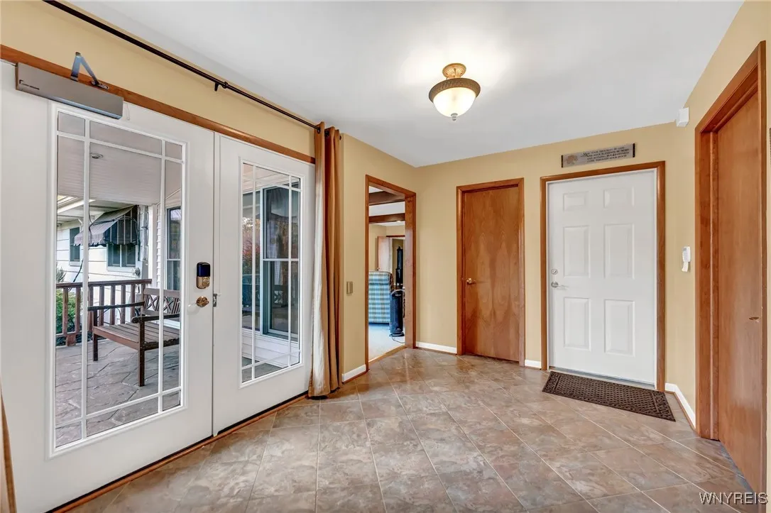 Electric handicap accessible door in the mudroom.