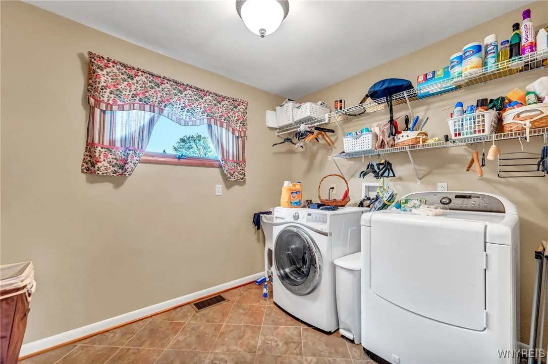 Extra large laundry room with double closets.