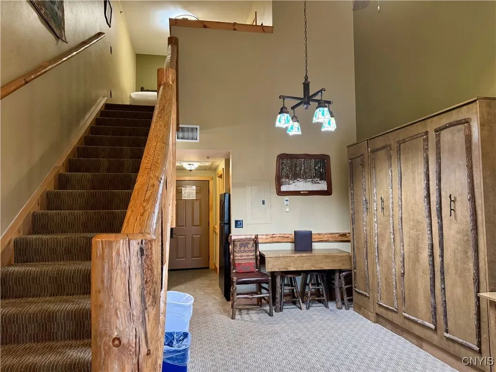 stairs with dining rm