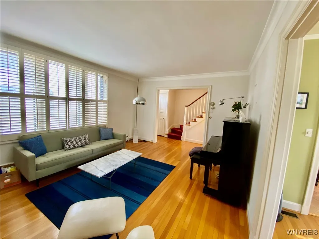 Hardwood floors and plantation shutters.