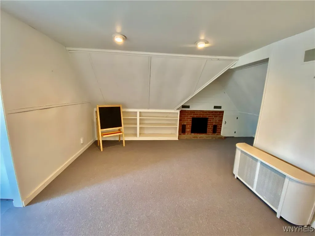 4th floor (attic space) is finished and adds additional living space or storage.