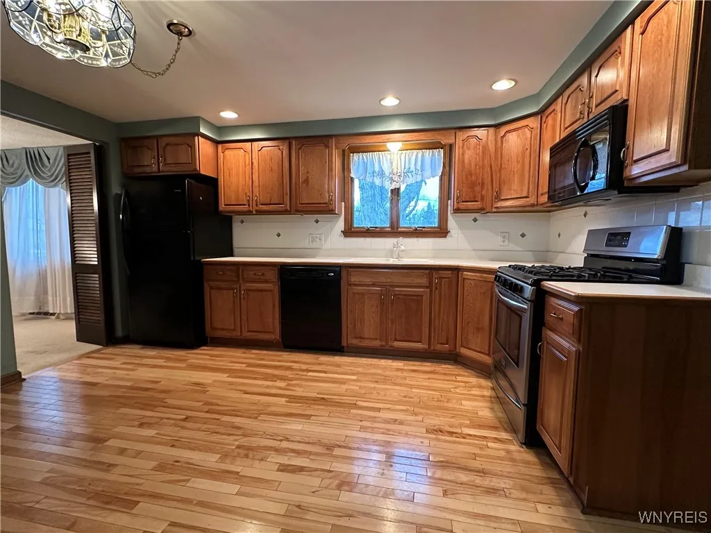Kitchen with beautiful hardwood!