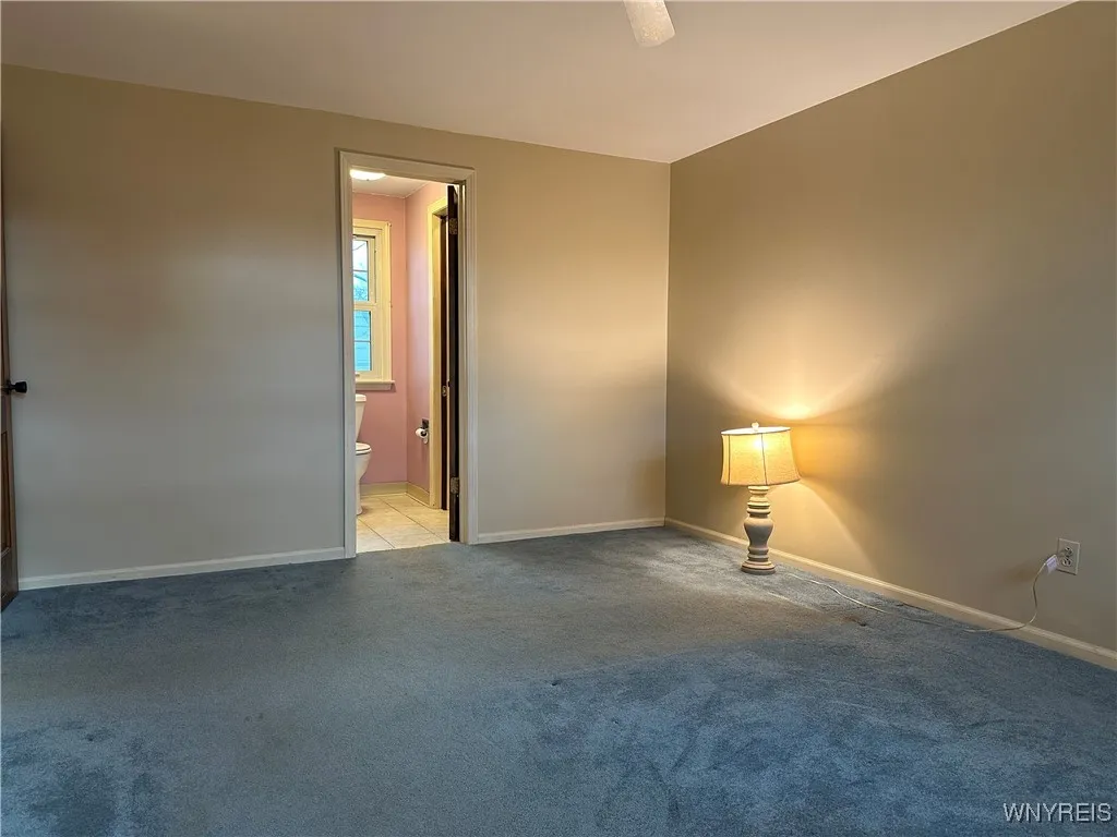Primary bedroom with bath