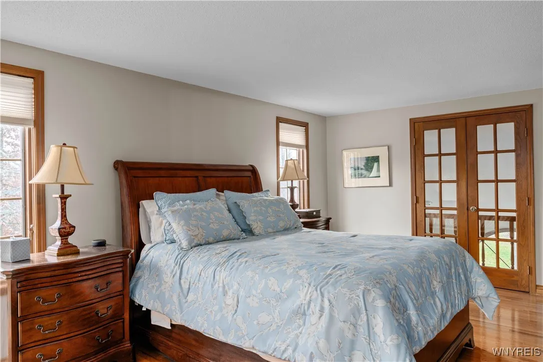 Owner's suite with unique Juliet balcony overlooking family room