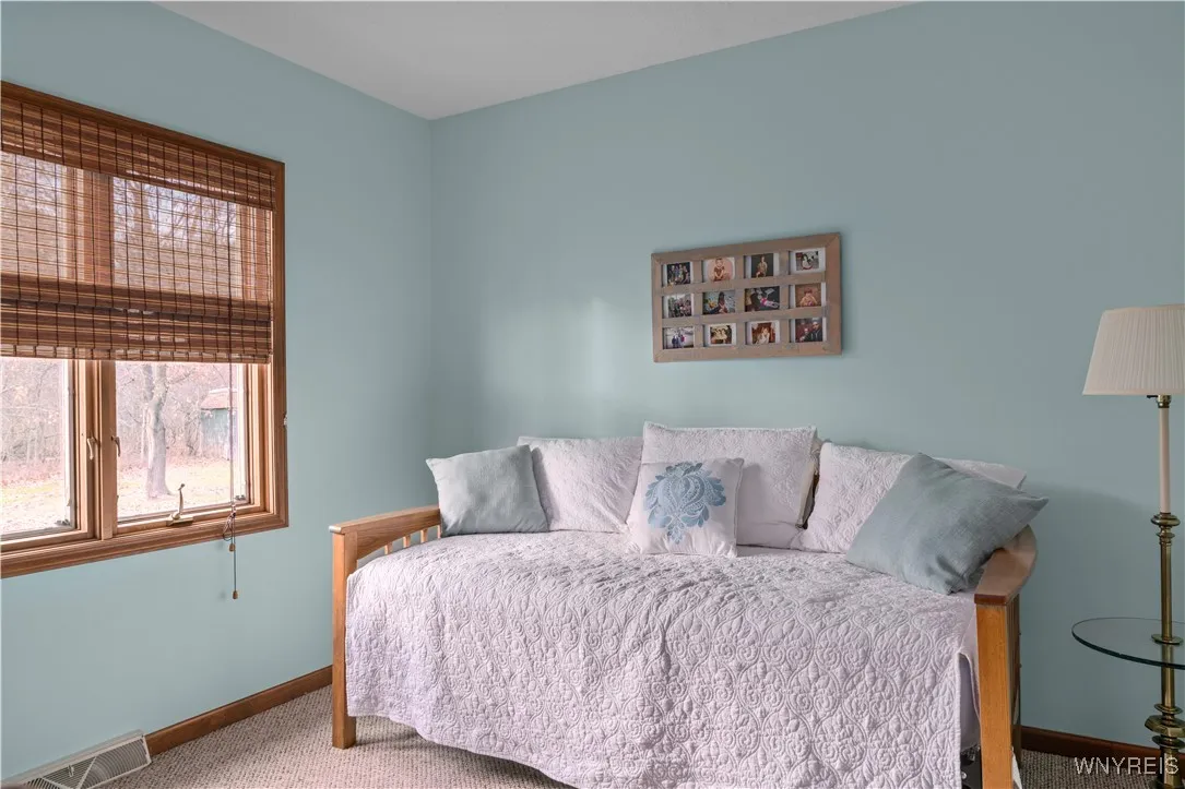 extra room on first floor that could be used as a bedroom or guest room (no closet)