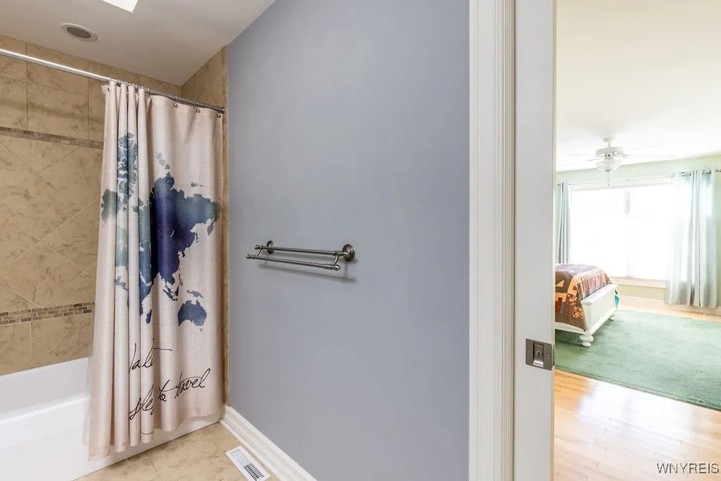 Pocket door leads to 2nd bedroom.