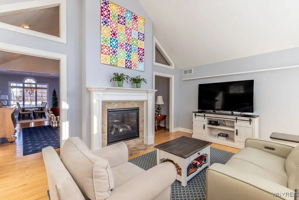 Sun room with double sided fireplace