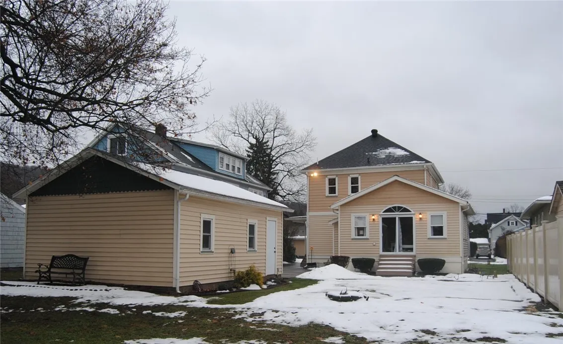 backyard and back of house and garage view