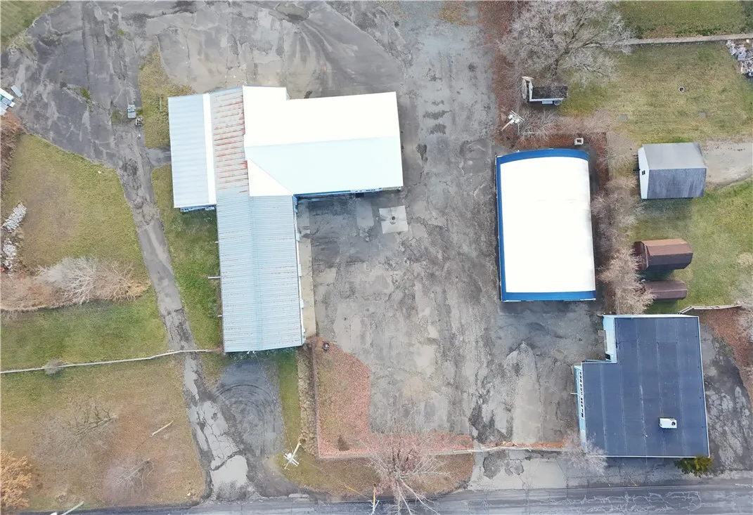 Over head of Brew House, Quonset and house