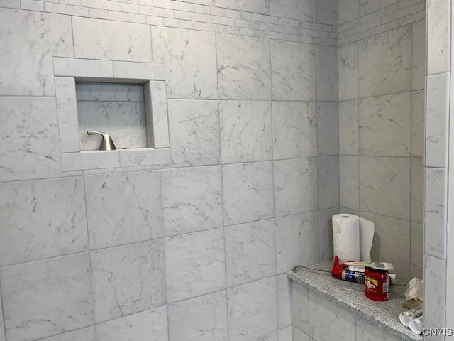 Master Shower with tile and seat