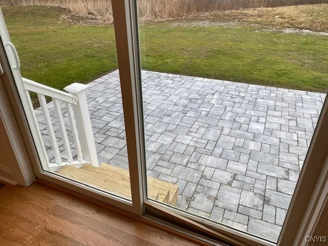 Patio to the rear, brik pavers to the front, its all included