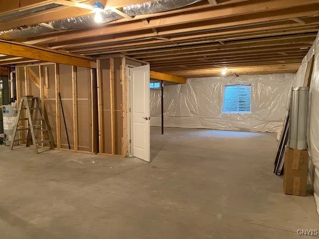 Huge 8\' tall basement with  egress and rough plumbing for full future bath