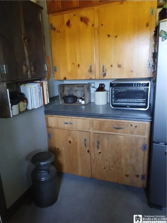 Corner next to refrigerator