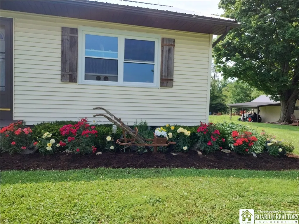 Front flower bed outside of living room windows
