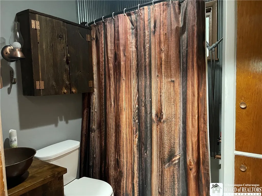 Bathroom with copper vessel sink