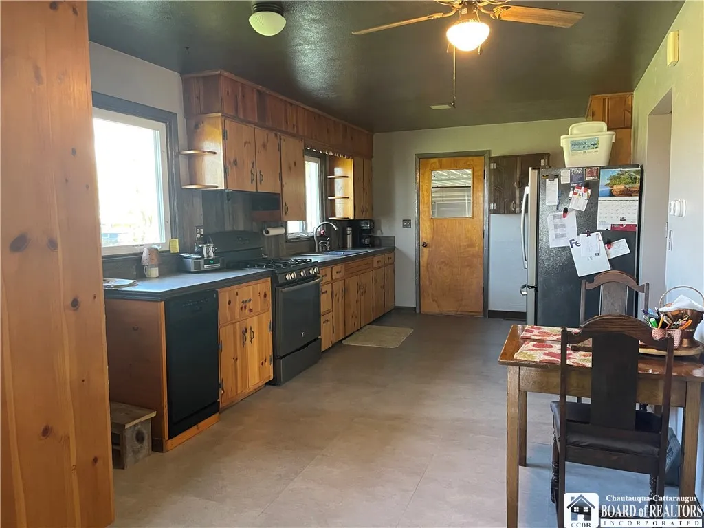 Kitchen to door to attached garage