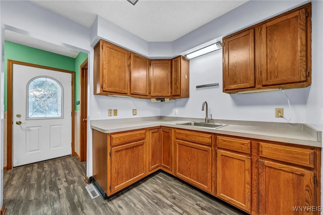 Galley kitchen. All appliances stay.