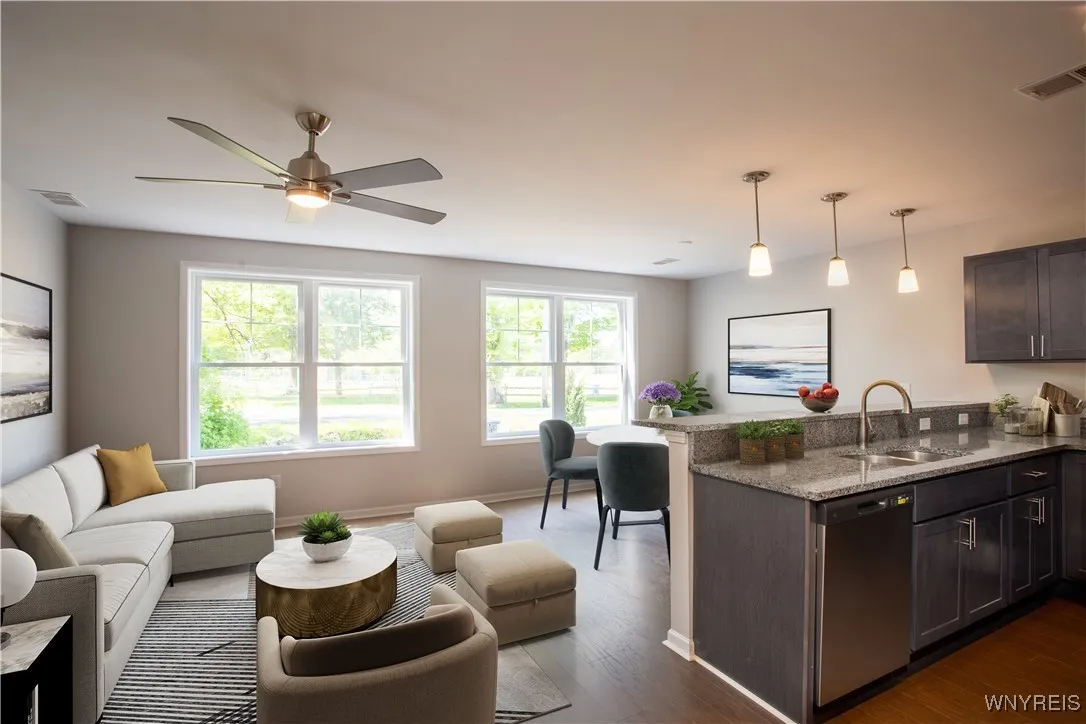 Staged living room/dining/kitchen