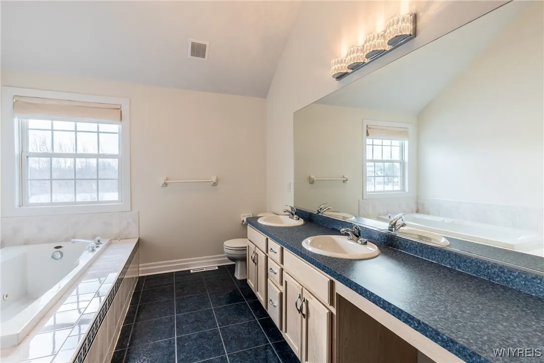 Master bathroom with double sink.