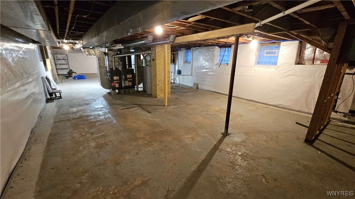 Large, dry basement with tall ceilings