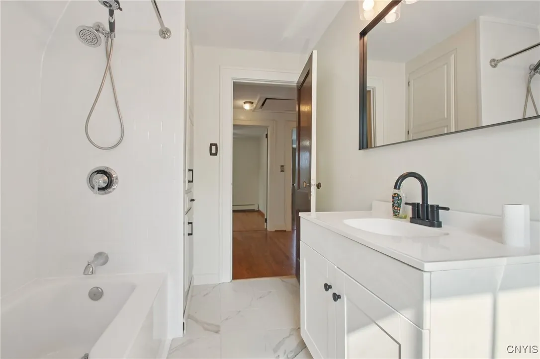Newly renovated upstairs full bath.