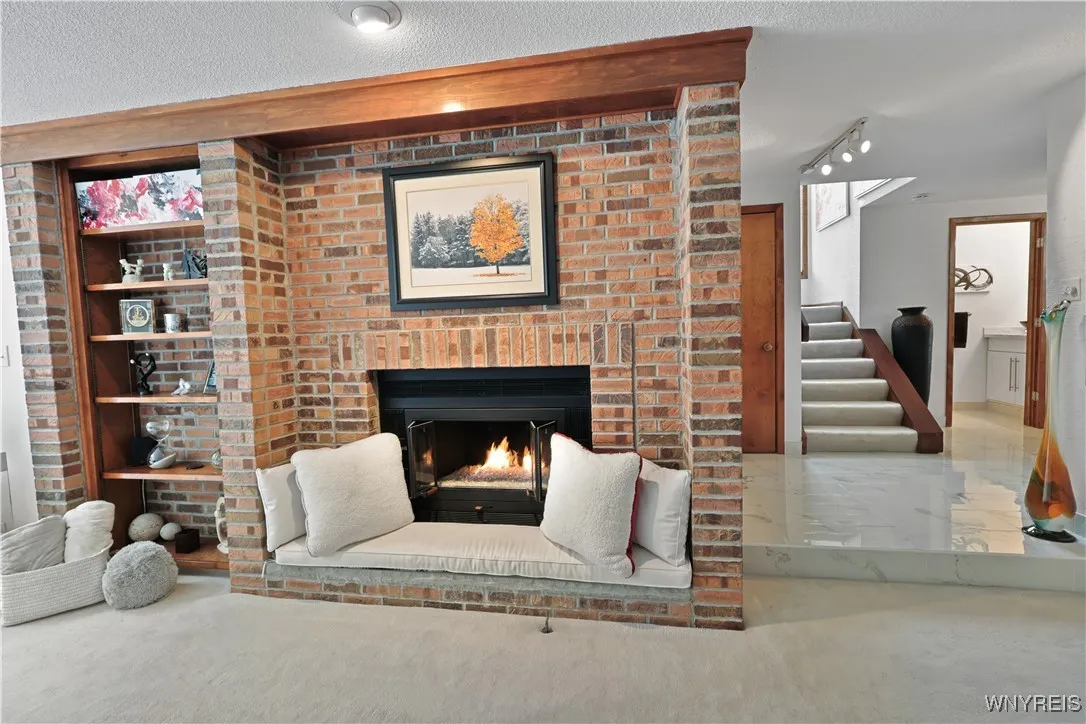 Brick fireplace w/with fire glass
