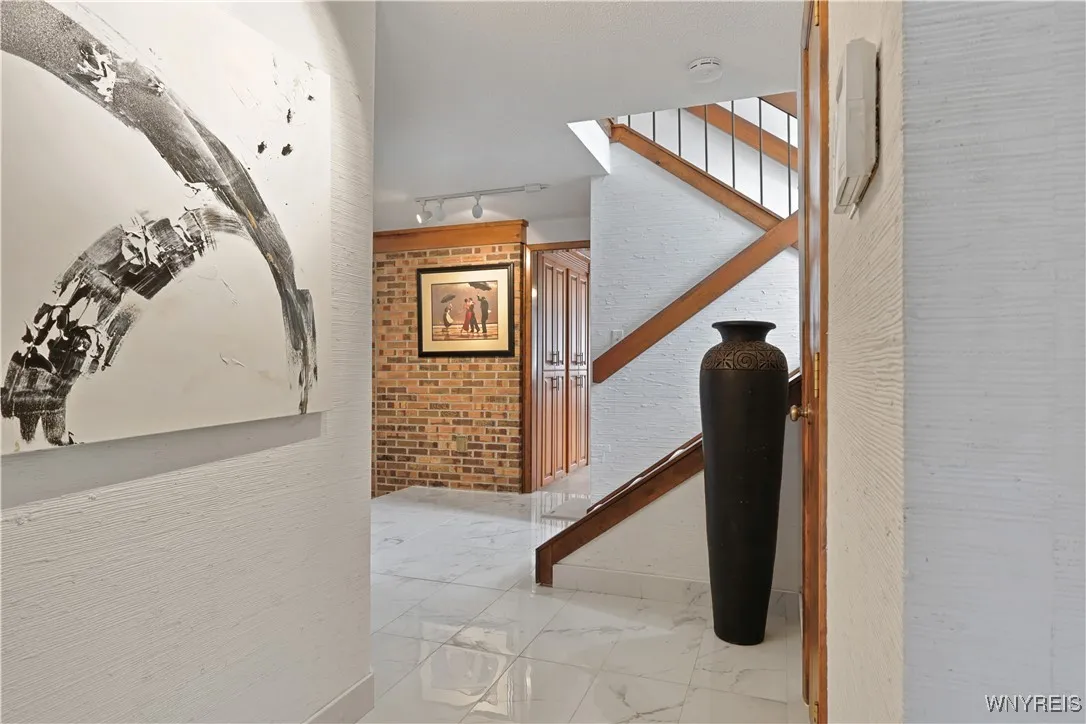 Front Entrance w/porcelain floors and bamboo wallpaper

