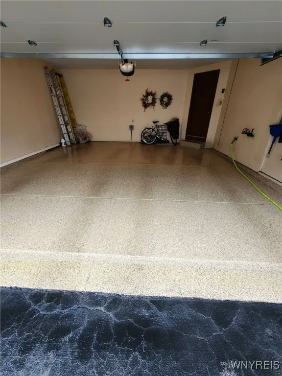 Garage w/epoxy floor and EV charger