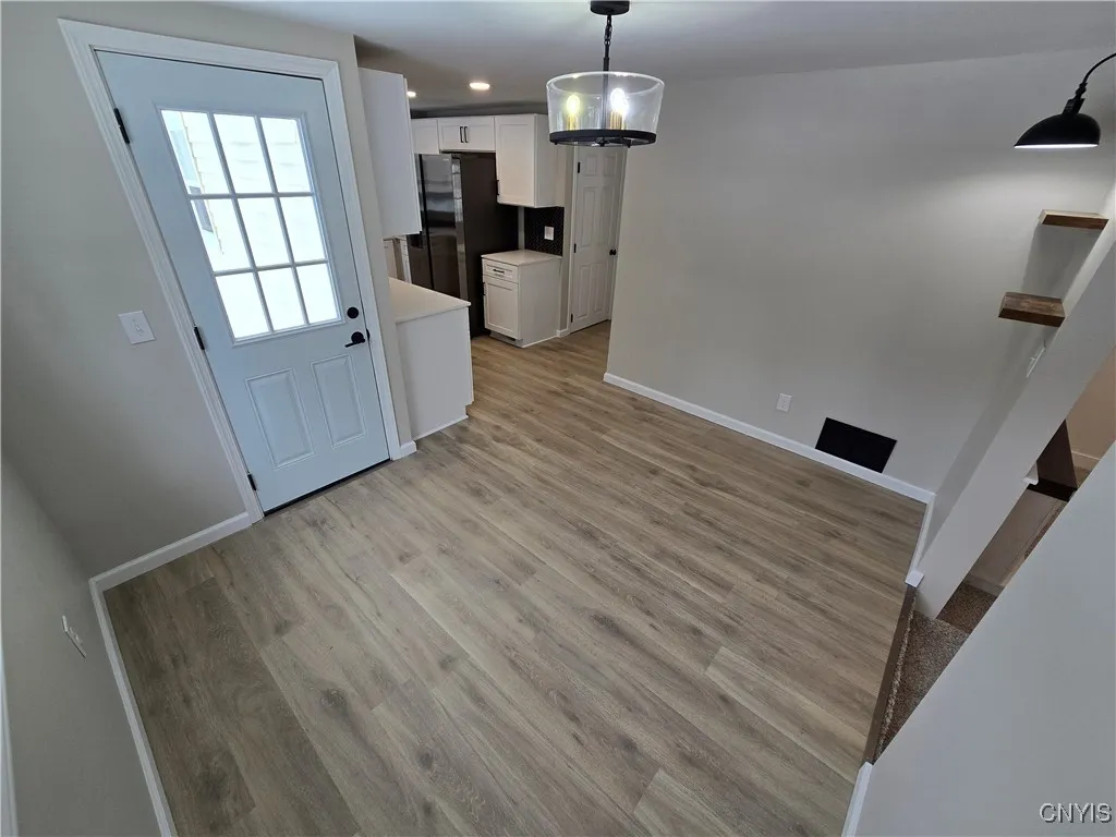 Dining room with door to backyard