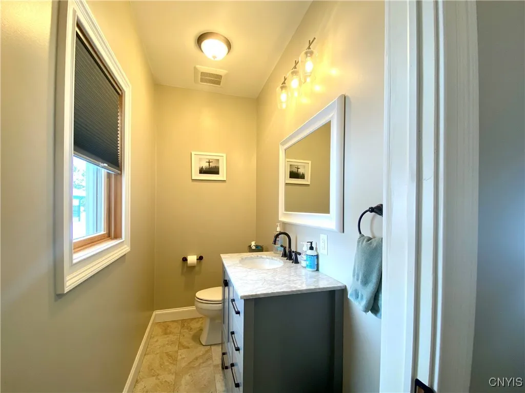 1st floor half bath off to left of Livingroom