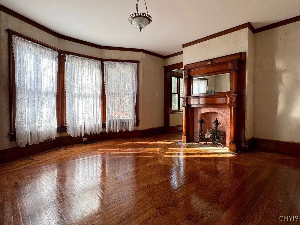 Formal Dining room.  Non-working Fireplace