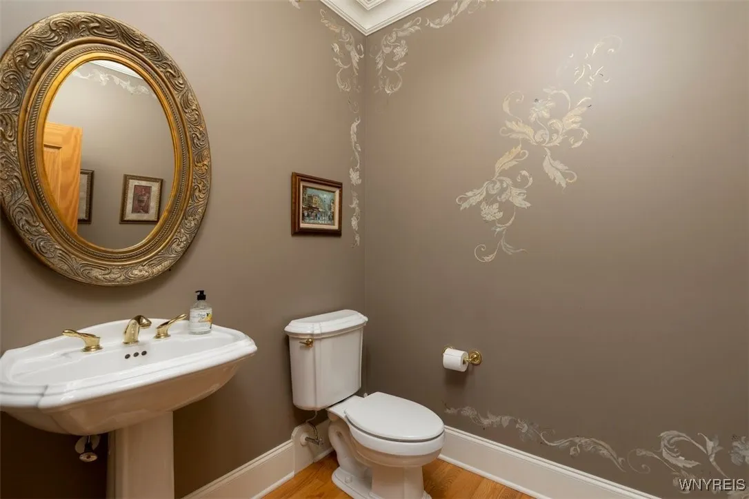 Powder room adjacent to office.