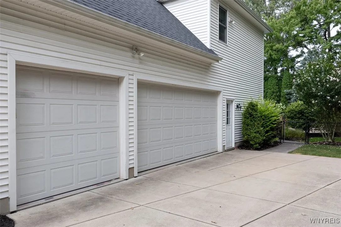 Three and a half car garage with heat and water.