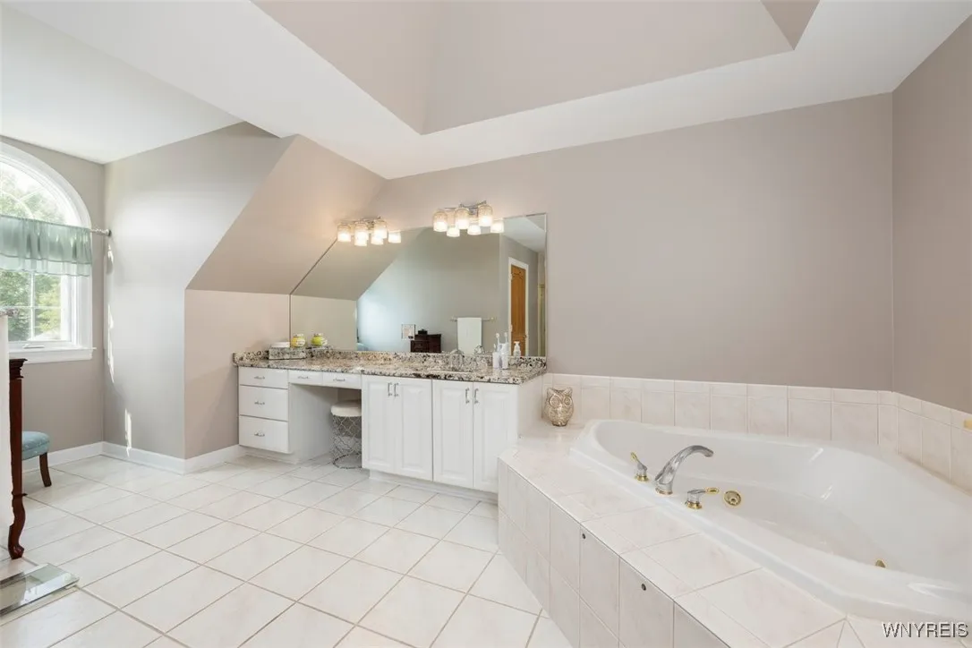 Owners bathroom with whirlpool tub, separate shower and water closet, double vanities makes getting ready a breeze!