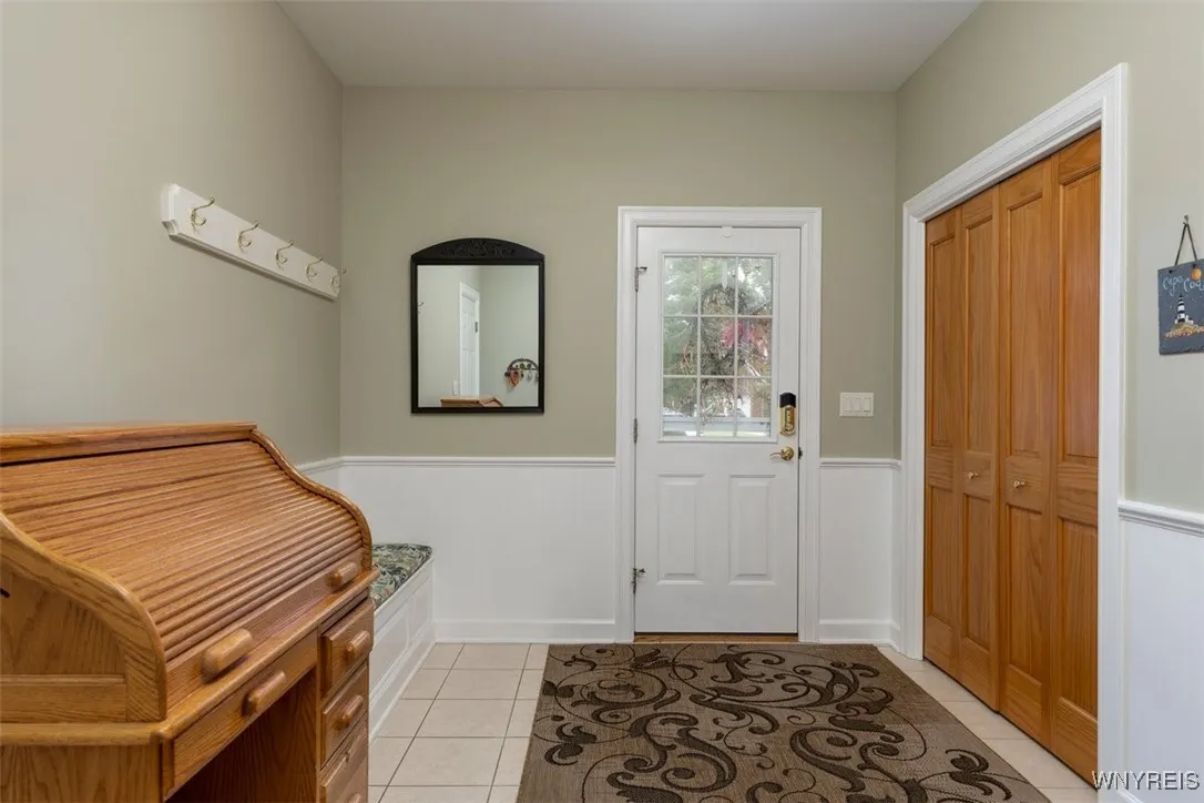 Mudroom entrance either from front of house or garage,  Double closets for all your outdoor gear.