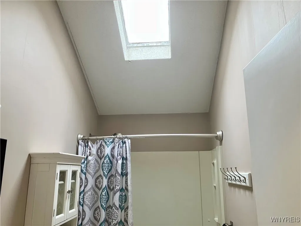 Second full bath has skylight