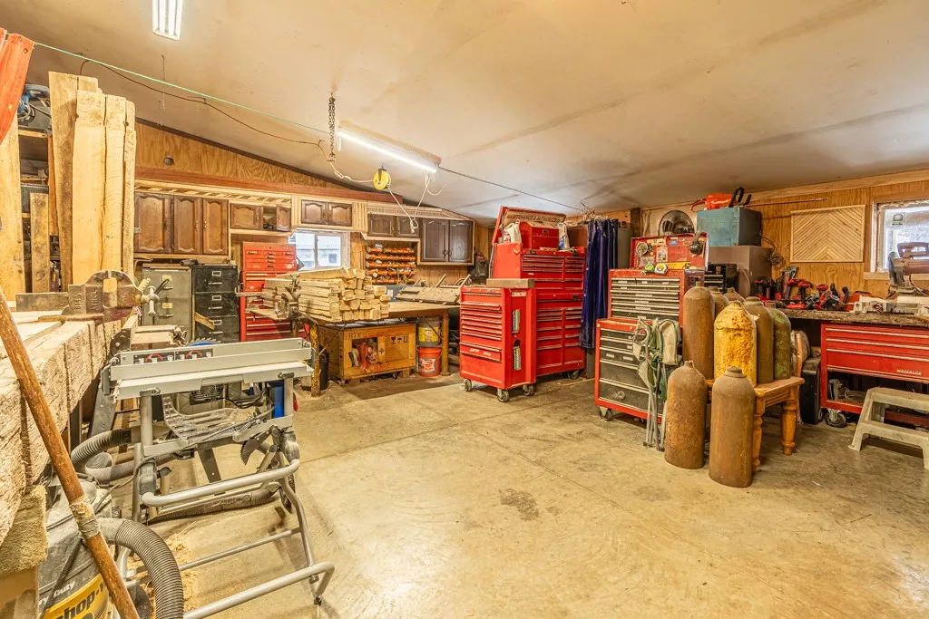 Rear shop area with direct access to kitchen, this could be a catering facility, bakery, retail. Woodworking shop