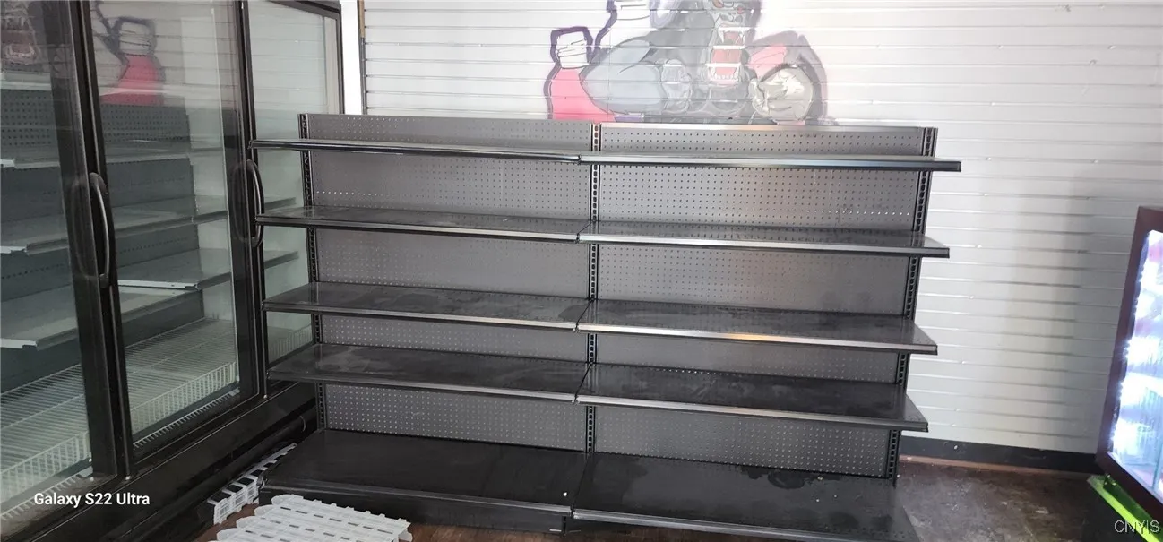 Back end of the store.  Out of the picture to the right is the door to the office space and half-bath room.