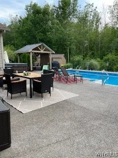Breakfast, lunch, dinner or snacks and cocktails by poolside. Gazebo for shade and shed for storage