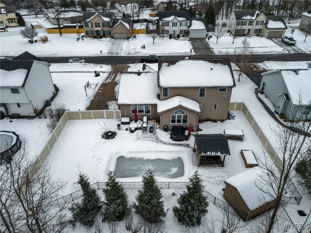 Birds eye view from back yard to street