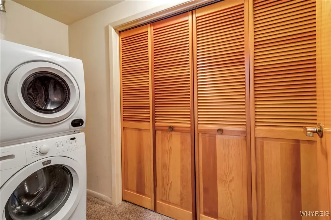 Laundry and closet off of 1st bedroom