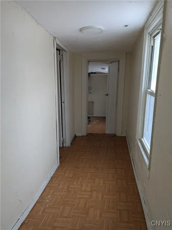 Upstairs Hallway toward back room (possible 3rd bedroom)