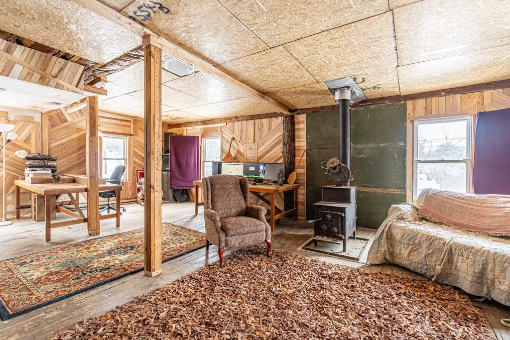 Upper level . could be renovated into bedroom area , full bathroom Steps away across from the office space.