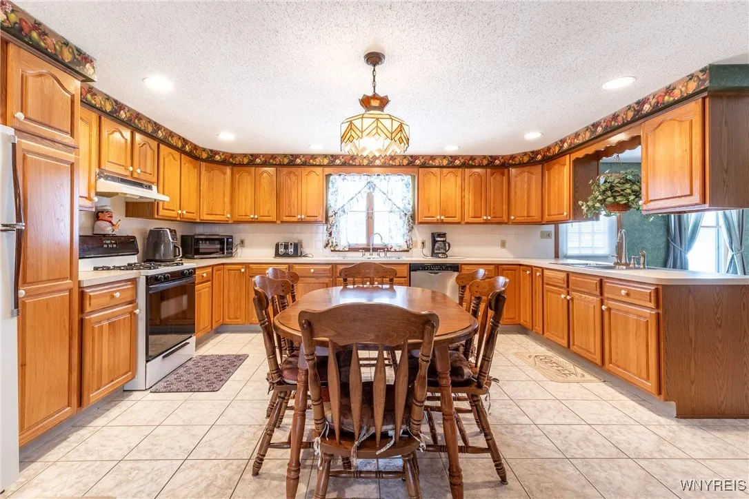 Huge kitchen with dining area