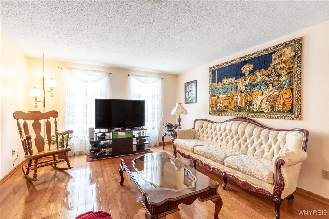 Livingroom with hardwood flooring  15 x 16