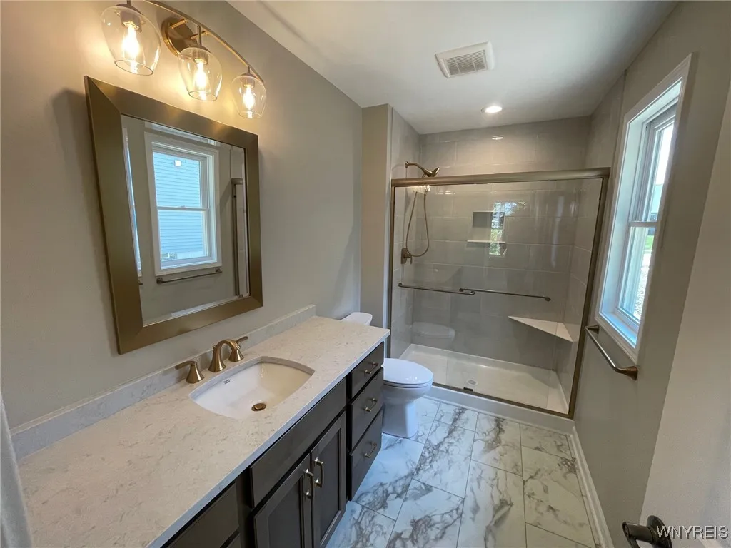 Spacious primary bath with walk in shower