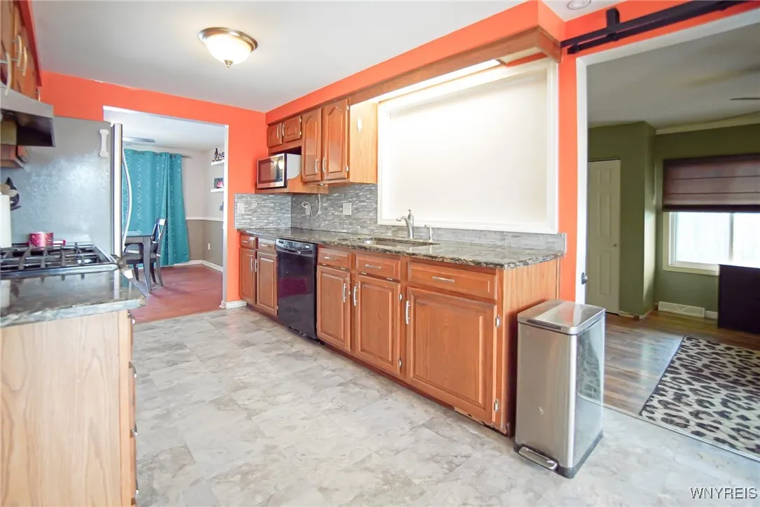 Kitchen w/ view of 4th oversized BR